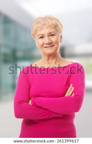 Old lady\'s portrait in pink casual clothes