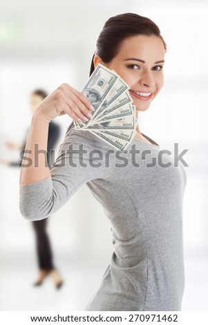 Happy smiling woman with us dollar money.