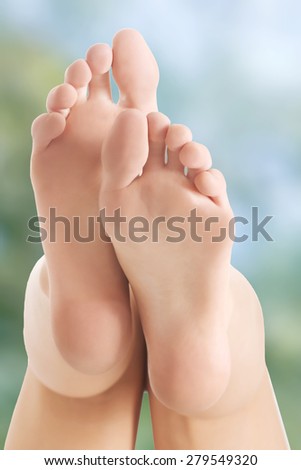 Pure and smooth female toes and heels.