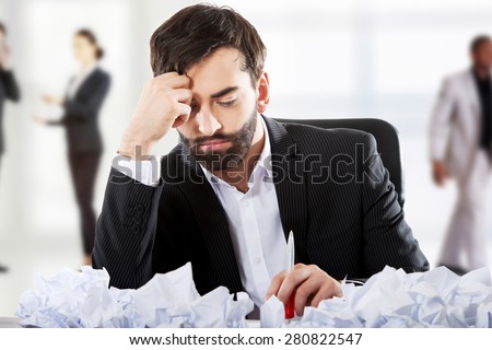 Young worried businessman can't find an idea.