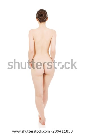 Nude woman standing back to camera Nude woman standing back to camera