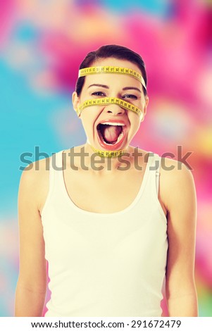 Screaming woman with a measure on her face