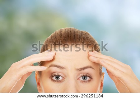 Woman\'s eyes in shock expression.
