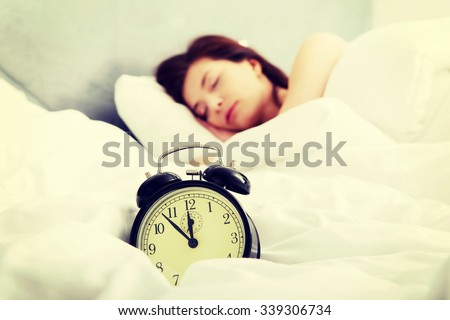 Beautiful woman sleeping in bed.