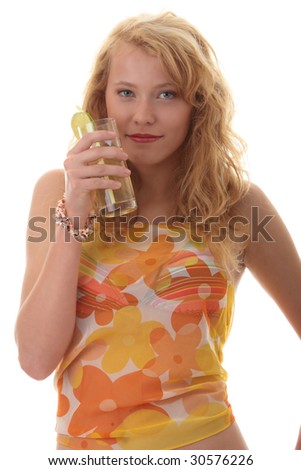 Young beautiful blond woman sipping cocktail (green ice tea) over white background