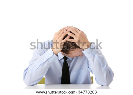 Businessman in depression with hand on forehead, isolated over white