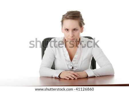 Young caucasian office worker woman behind the desk. Isolated on white background