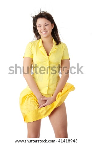 Young beautiful woman in yellow summer dress and yellow shirt, isolated on white background