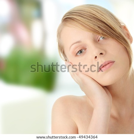Beautiful woman portrait with hands on head
