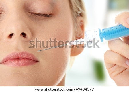 Beautiful woman receiving a injection