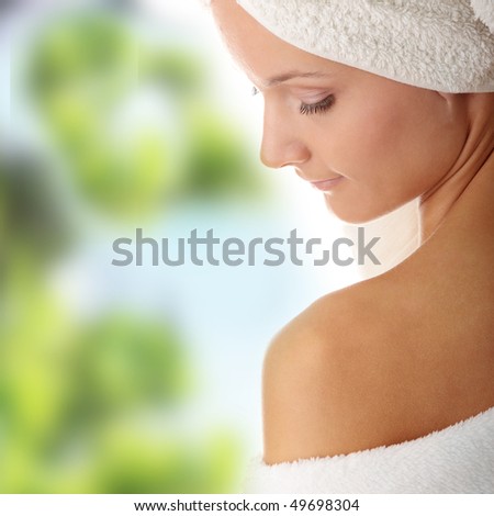 Relax concept:  beautiful nude woman with soft skin in bathtrobe