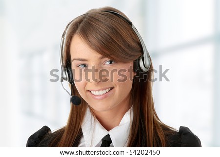 Beautiful Call Center Woman Wearing A Telephone Headset