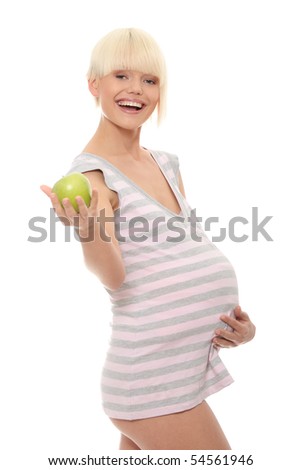 Young pregnant woman with green apple, isolated on white background
