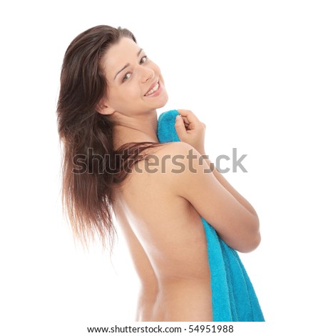 stock photo Attractive young nude woman covered by blue towel 