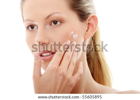 Woman Applying Cream