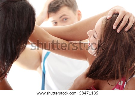 Jealous woman fight for a guy. Isolated on white