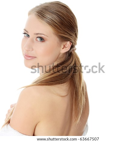 stock photo Young beautiful blond teen woman in bathrobe 