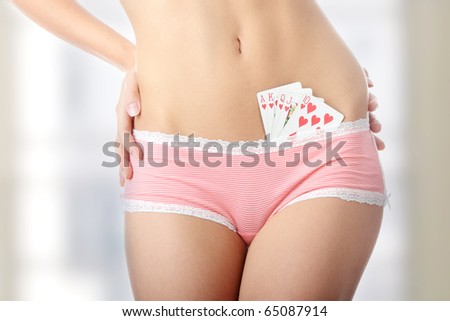 Sexy lady with poker combination