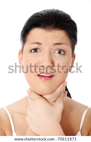 stock photo Throat pain concept Young woman touching her throat