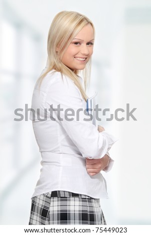 Student woman with note pad, isolated on white background
