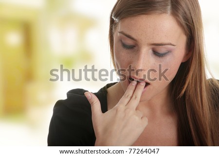 Young woman suicide, gesturing gun in mouth with her hand