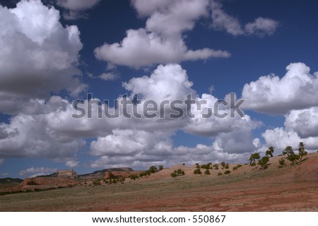 new mexico blue sky rolling hills and clouds