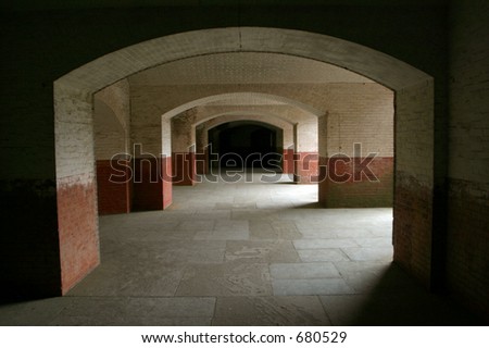 open outdoor hallway prison concrete tunnel path
