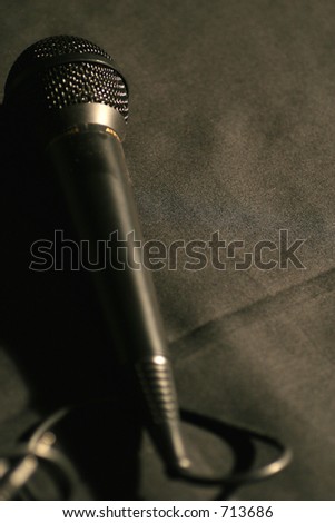 black microphone on black cloth