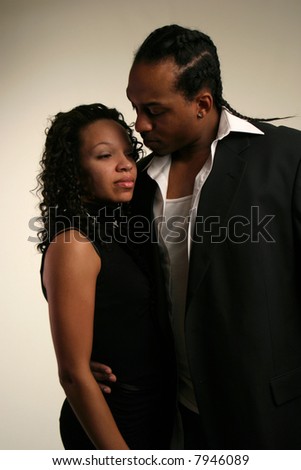 Black man and woman posing