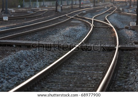 Railroad tracks leading the eye to the horizon.