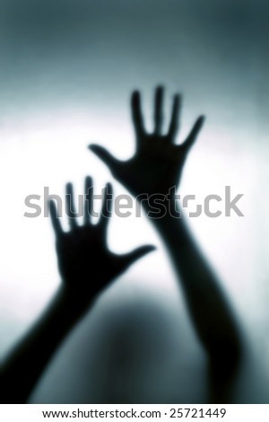 A blurred  hands pressed glass