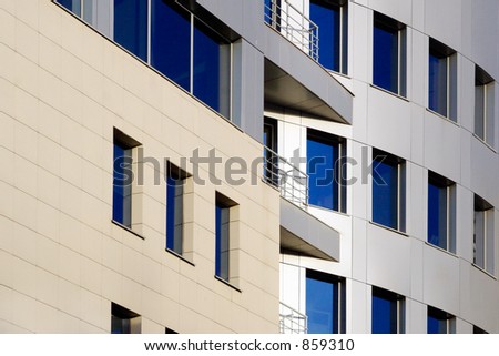 Feature of a modern glass coating of modern office buildings-strengthen blueness of the sky, thus making their elegant
