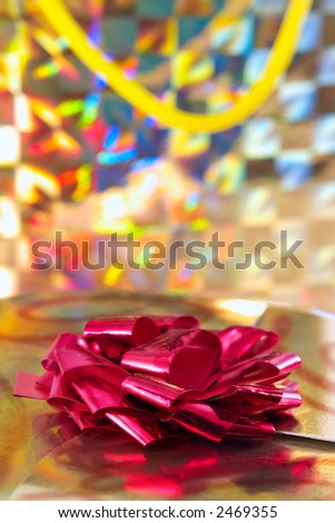 Gift golden box with chocolate on bright background