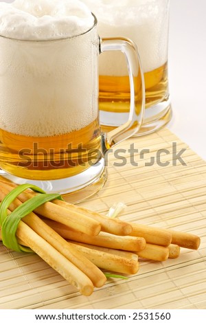 Beer and snack-grain grissini with cheese and an onions