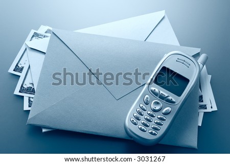 Envelope, mobile phone, dollars-conditions of the modern businessman