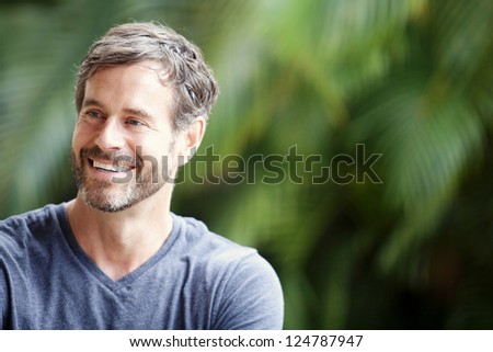 A happy mature man smiling