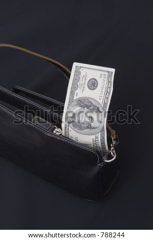 money in woman\'s purse