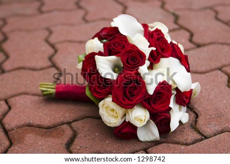 calla lily and tiger lily bouquet. red apr anniversary Red