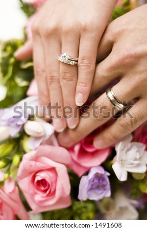 stock photo wedding hands over flowers