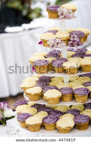 stock photo cupcakes on tier at wedding reception