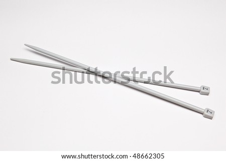 two long knitting needles isolated on white background stock photo long knitting needles 450x320 stock photo two long knitting needles isolated on white background 48662305 Long Knitting Needles