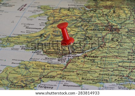 Newport marked with red pushpin on map. Selected focus on Cardiff and bright red pushpin. Pushpin is in an angle.