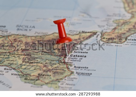 Catania marked with red pushpin on map. Selected focus on Catania and pushpin. Pushpin is in an angle.