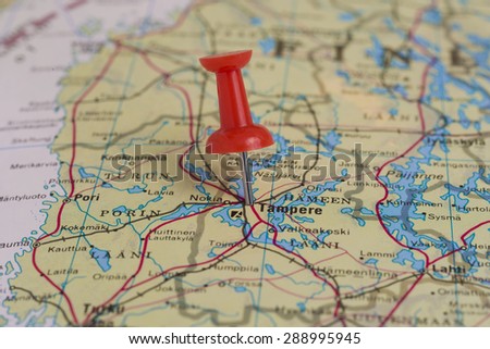 Tampere marked with red pushpin on Finland map. Selected focus on Tampere and pushpin.