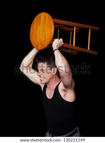 stock-photo-an-aggressive-angry-man-ready-to-fight-with-a-bar-stool-in-his-hands-130221149.jpg
