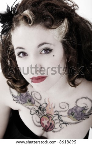 Glam rockabilly pinup girl Model is wearing purple colored