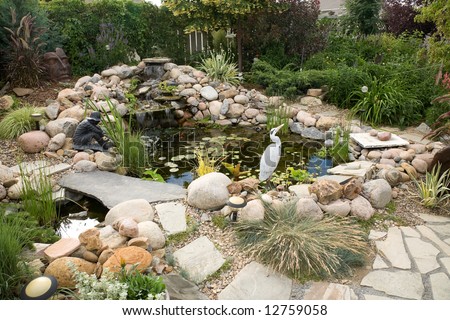 A Large Water Feature Turns A Small Backyard Into A Delightful ...