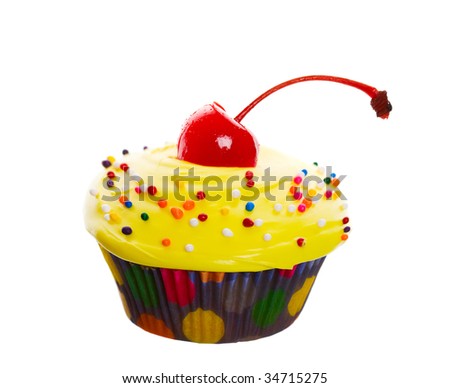 stock photo Delectable yellow cupcake topped with a cherry and 