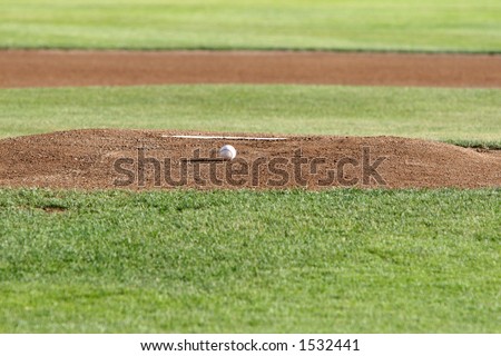 Baseball and pitcher\'s mound