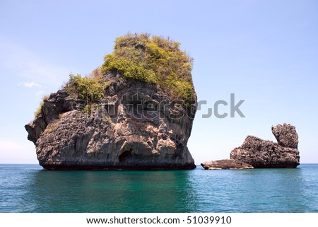 Landscape with rock and clear ocean